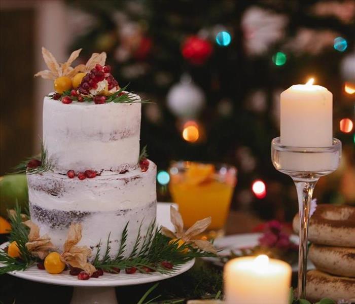 Picture of a Holiday Table with a Cake and Candles