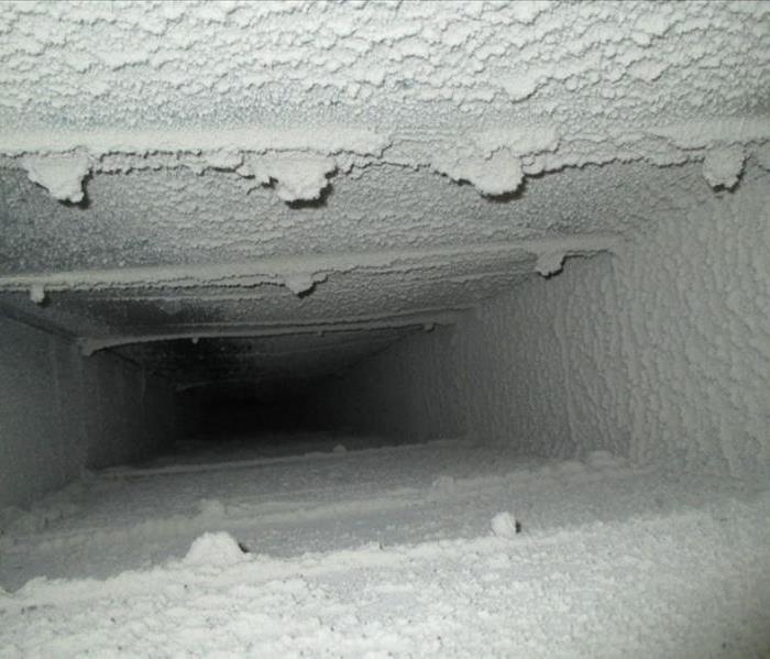 Picture of the inside of a dirty HVAC duct
