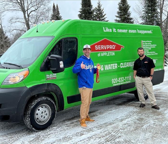 Picture of Beau & Nick Baumgartner in front of one of our SERVPRO trucks